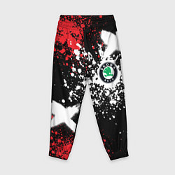 Детские брюки Шкода на фоне граффити и брызг красок